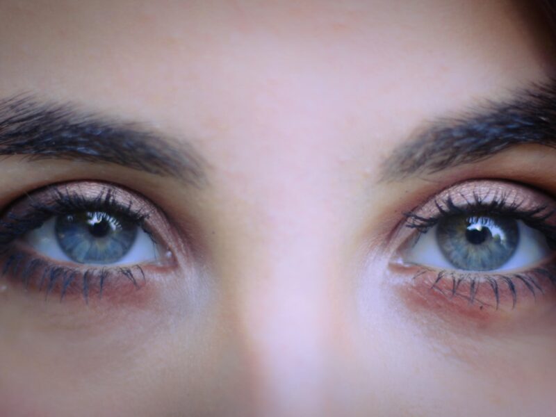 persons blue eyes and black hair